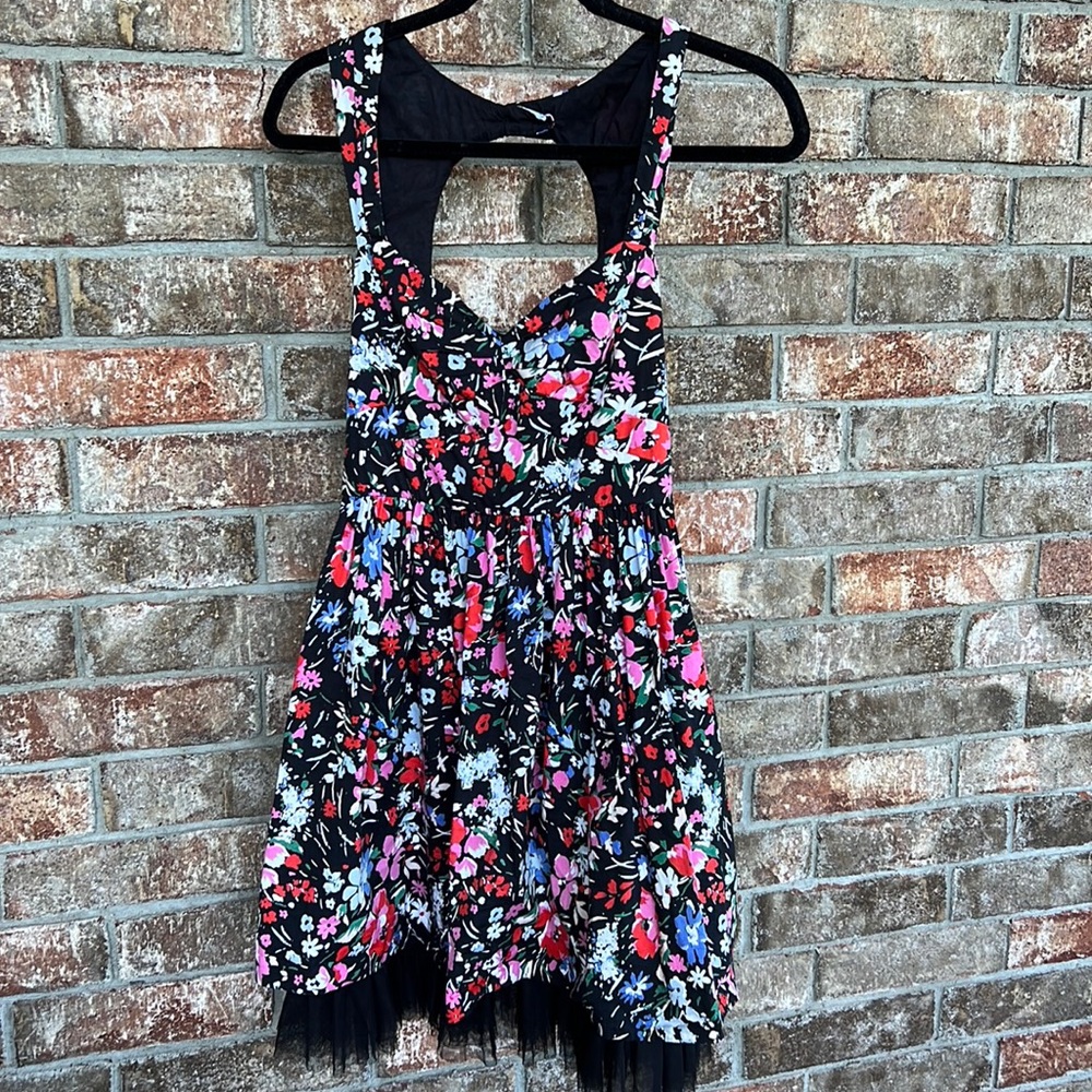 Free People sunkissed floral mini dress with black tulle. Size 4